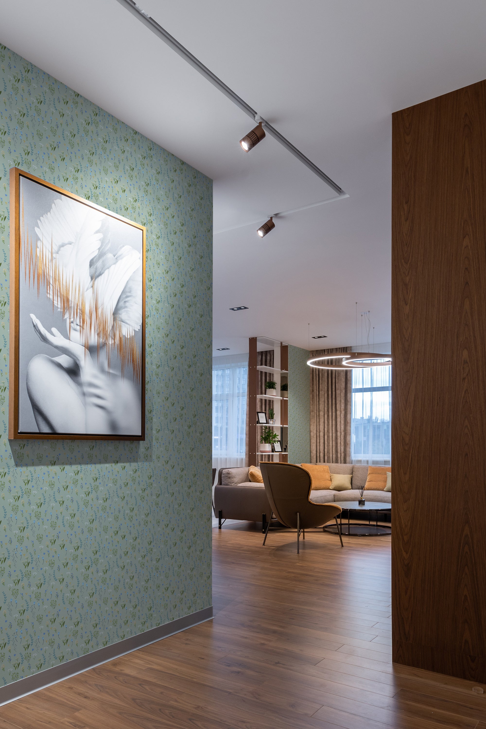 Blue floral meadow wallpaper with delicate, intricate patterns of small flowers and leaves, creating a soft and natural aesthetic, enhancing the room's decor with a serene and calming ambiance. Traditional wallpaper.