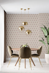 A room with walls covered in a traditional wallpaper pattern with small vintage roses on a lattice background, giving the space a classic and elegant ambiance.