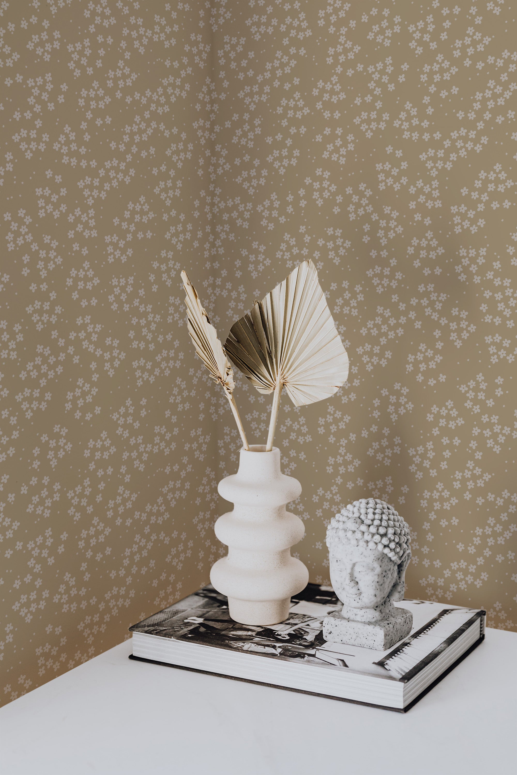 Self-adhesive brown floral wallpaper with delicate white blooms and dots pattern, adding a vintage charm to the room decor.