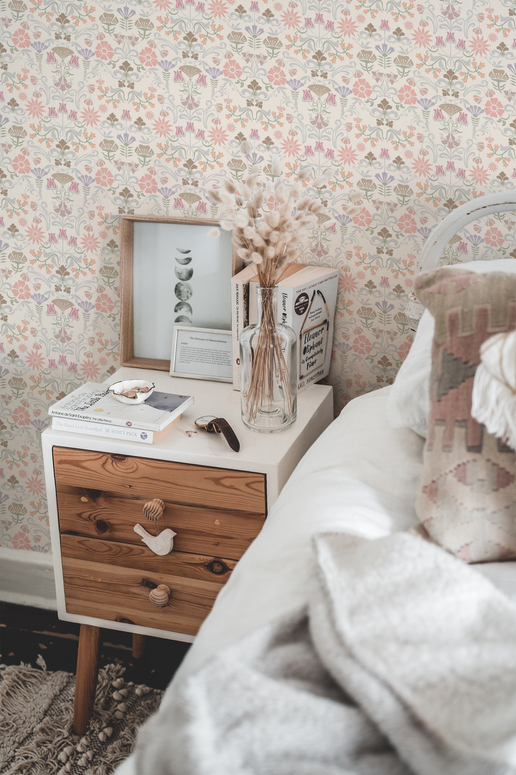 Self-adhesive Spring art nouveau wallpaper with floral and botanical patterns in a cozy room setup with a bedside table and decorative items.