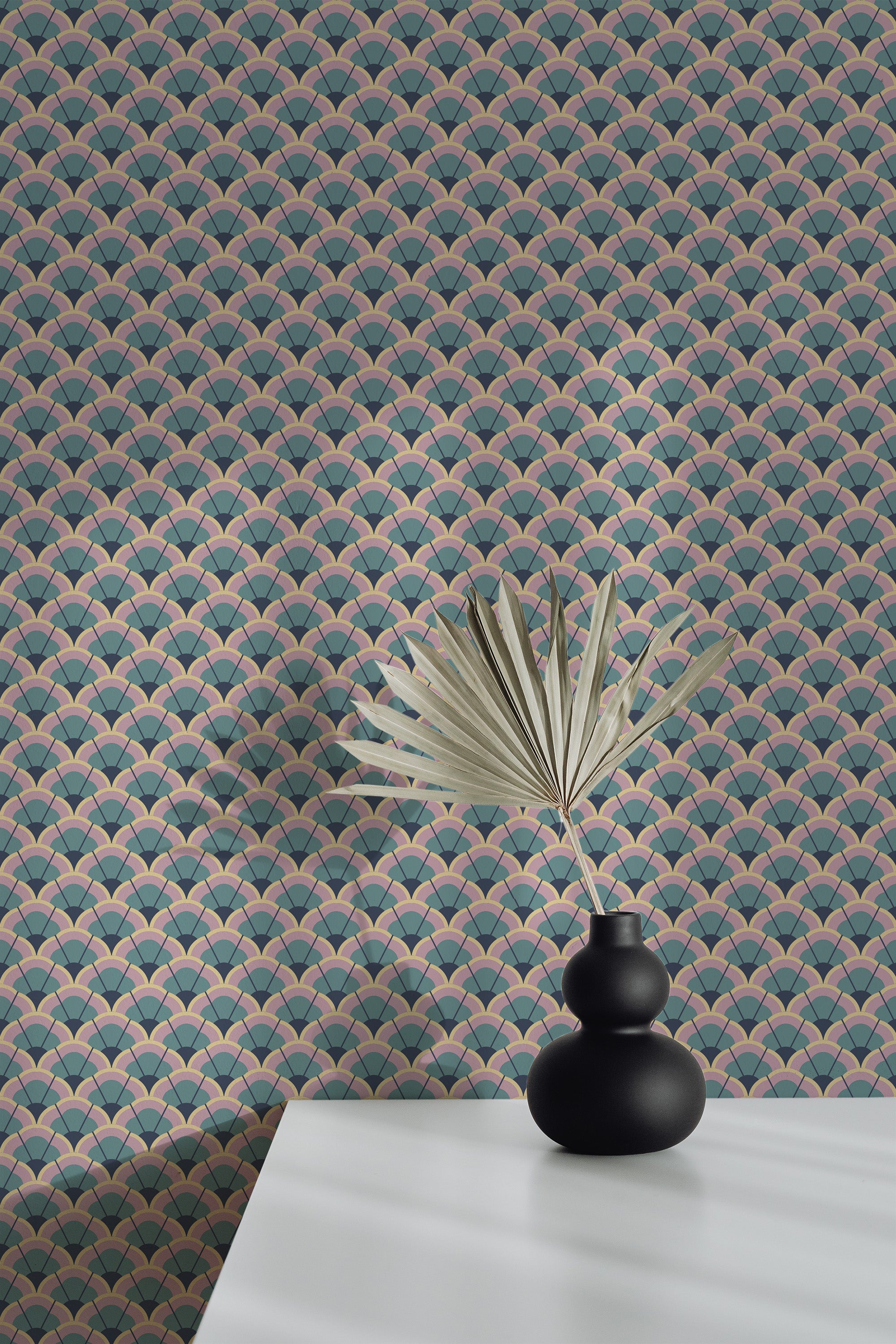 Self-adhesive Pink and Green Art Deco wallpaper with geometric scalloped pattern in a room, accented by a decorative vase on a white surface.