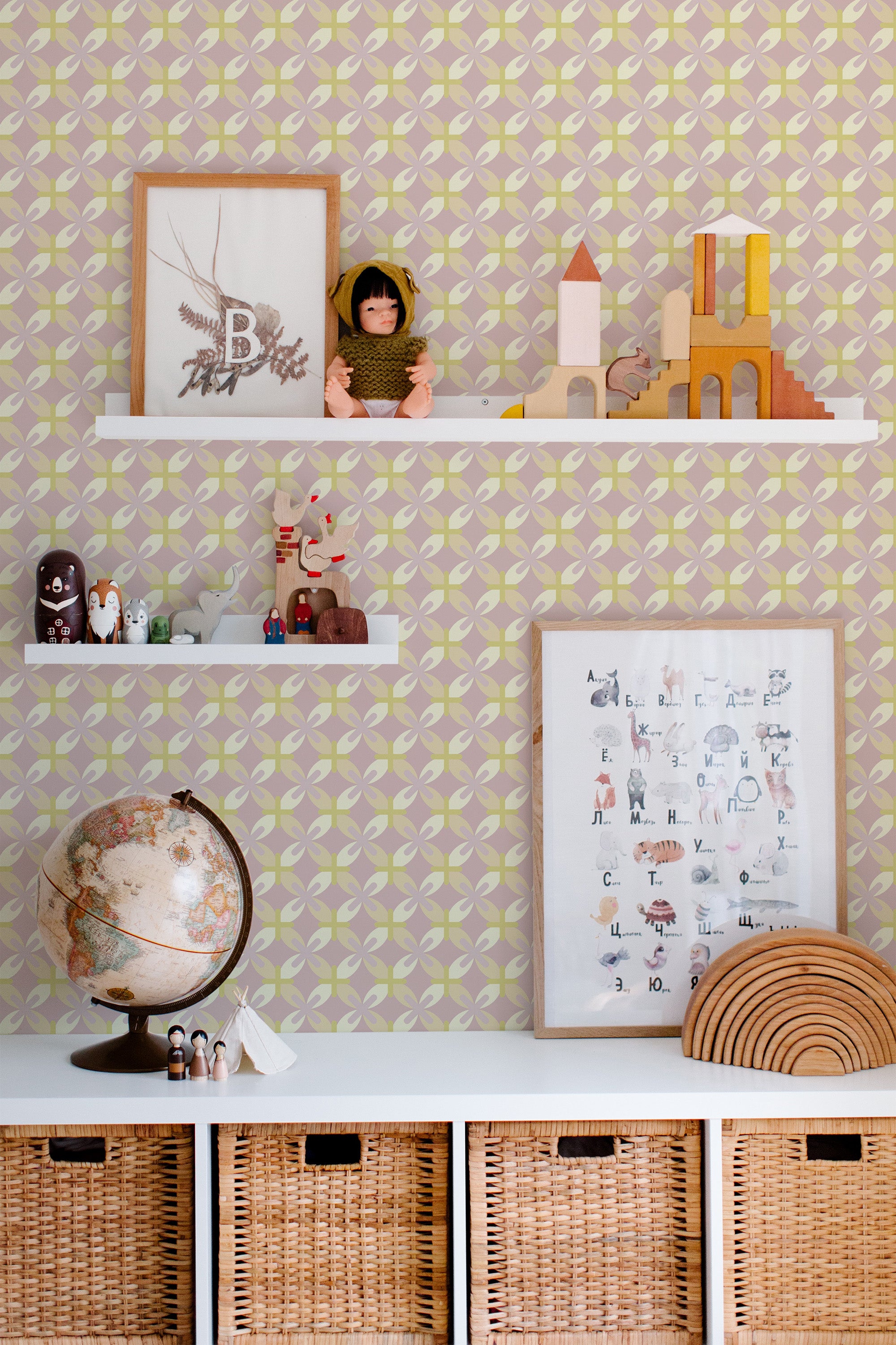 Self-adhesive Pastel Retro Geometric wallpaper with soft, muted colors in a repeating pattern on a room's wall, complemented by decorative items and framed artwork.