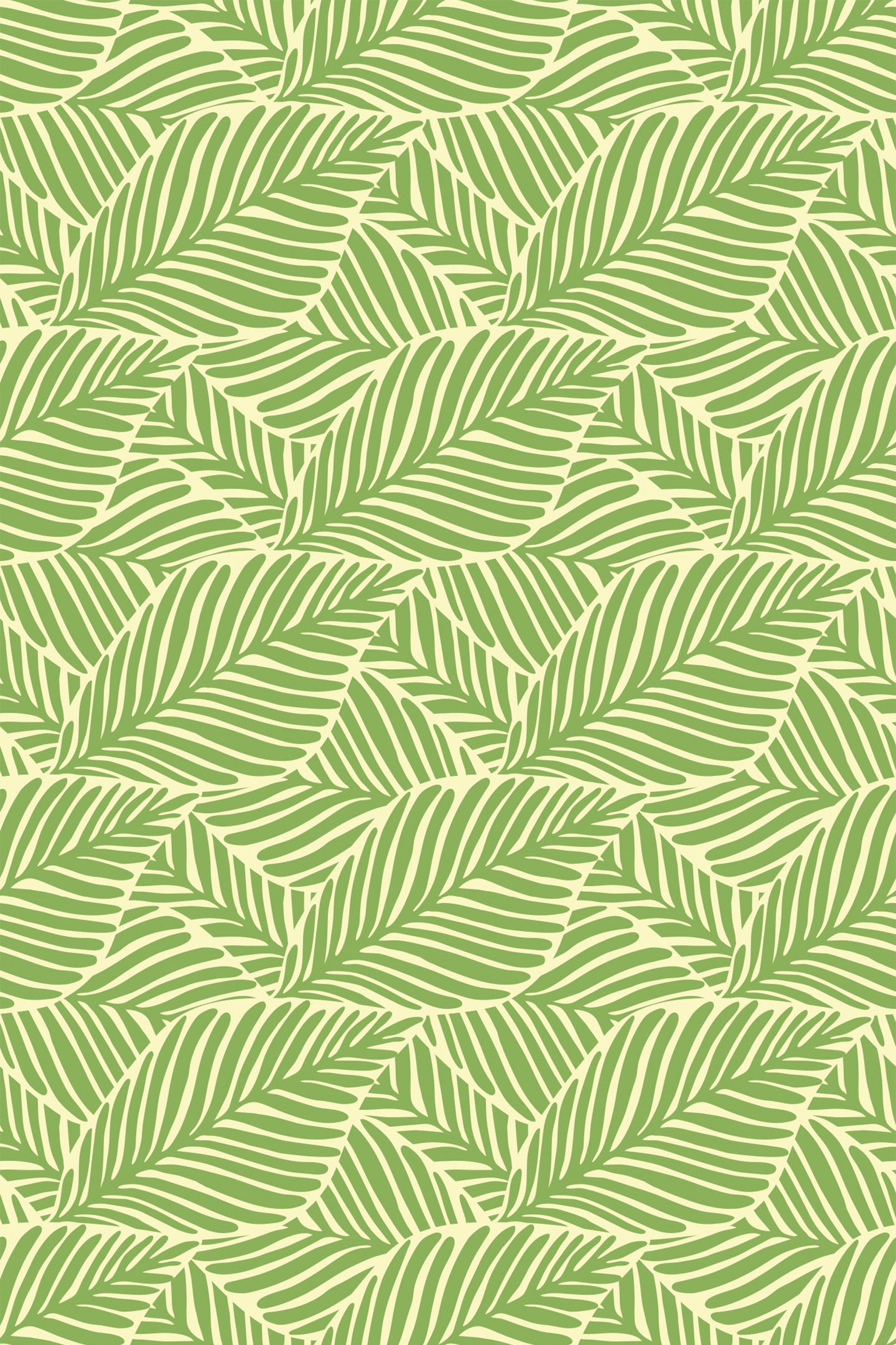Pattern of overlapping green leaves on a light background, creating a vintage botanical look for a peel and stick removable wallpaper.
