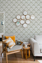 living room cozy sofa armchair pillows decor sage green regal by sara t peel stick wallpaper
