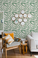 living room cozy sofa armchair pillows decor funky green an beige peel stick wallpaper
