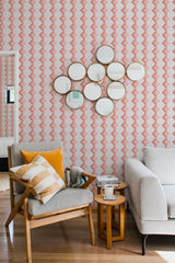 living room cozy sofa armchair pillows decor pink retro geometric peel stick wallpaper