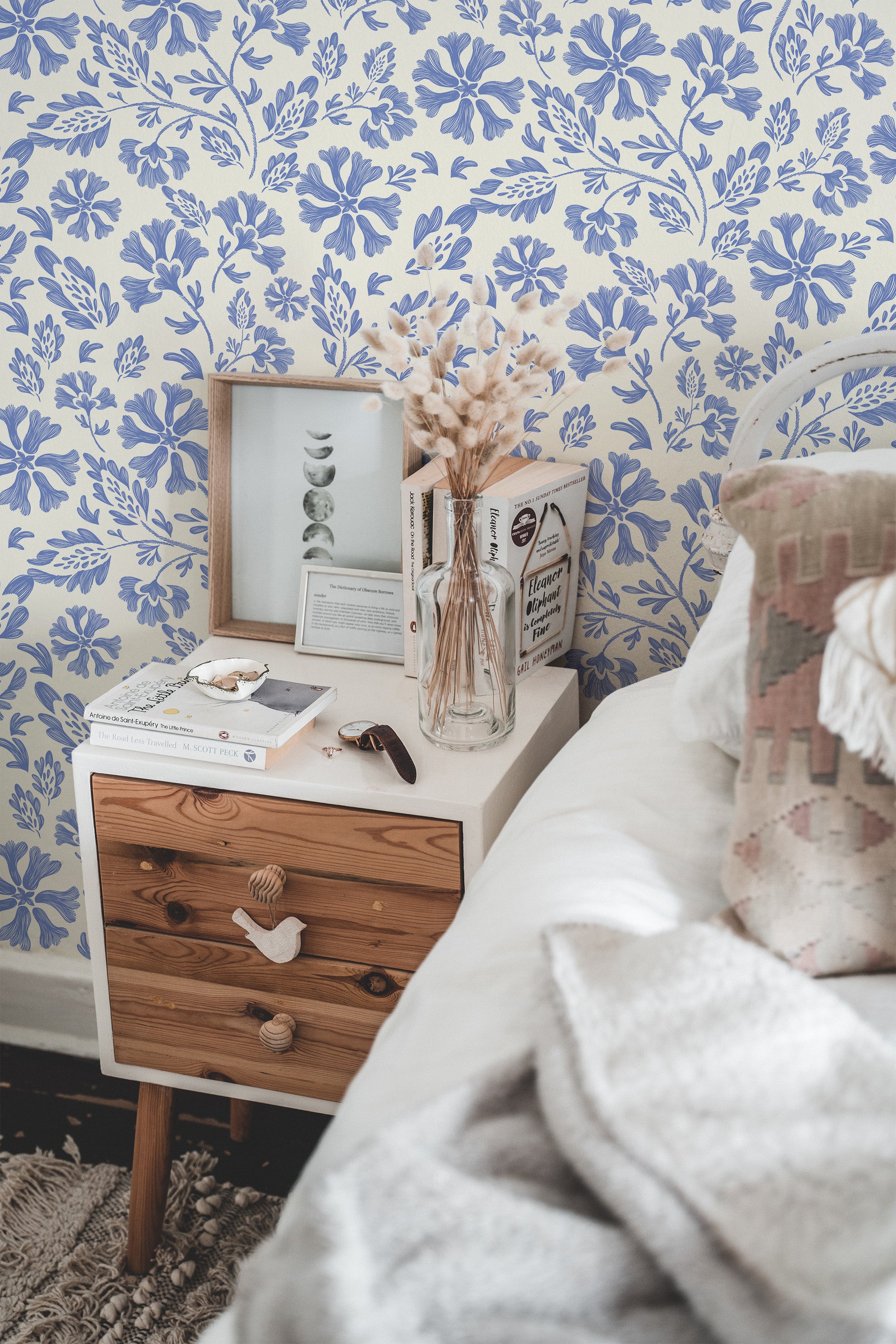 chic bedroom interior nightstand picture frame decor blue and beige floral traditional wallpaper
