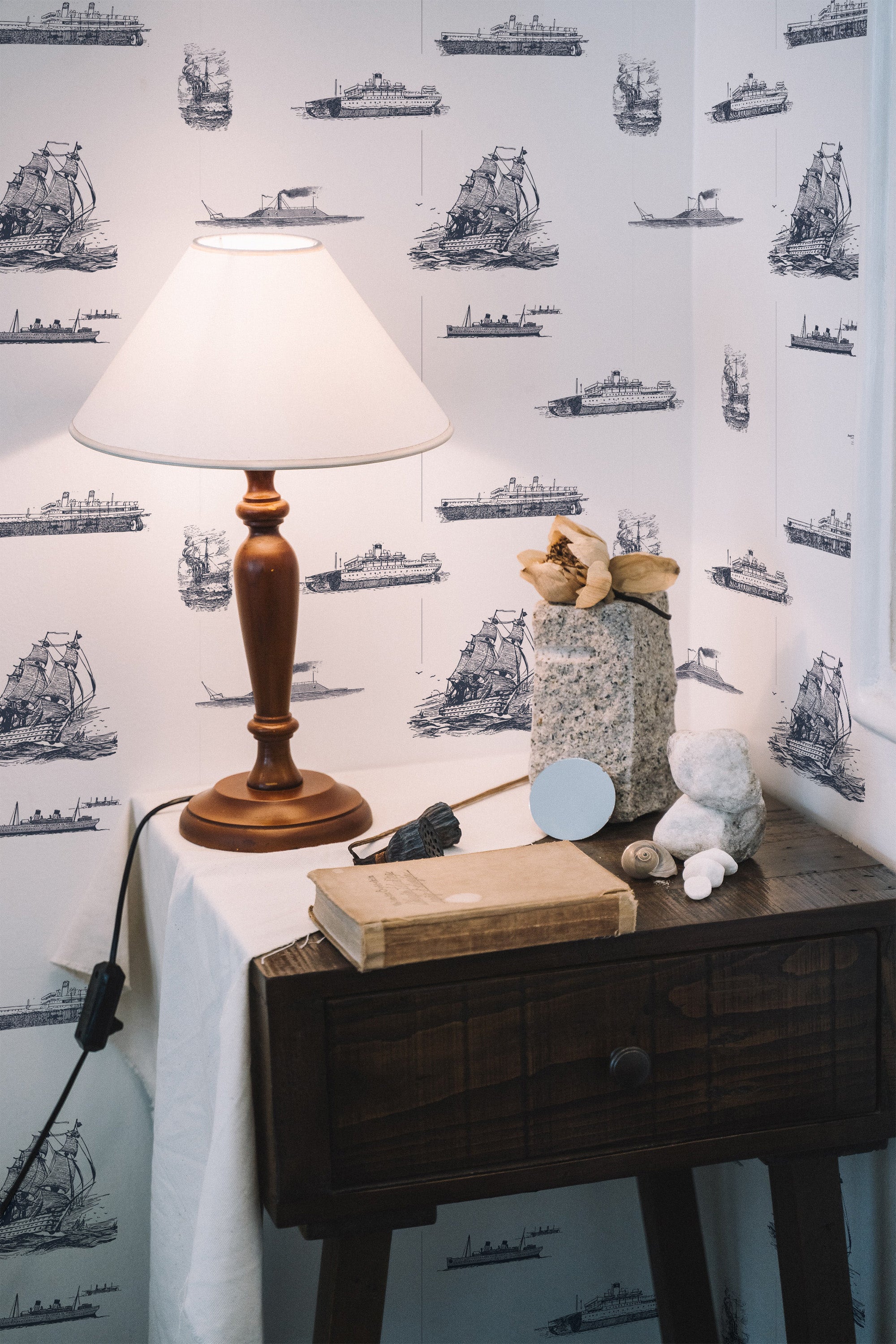 peel and stick wallpaper vintage ship pattern accent wall bedroom nightstand interior