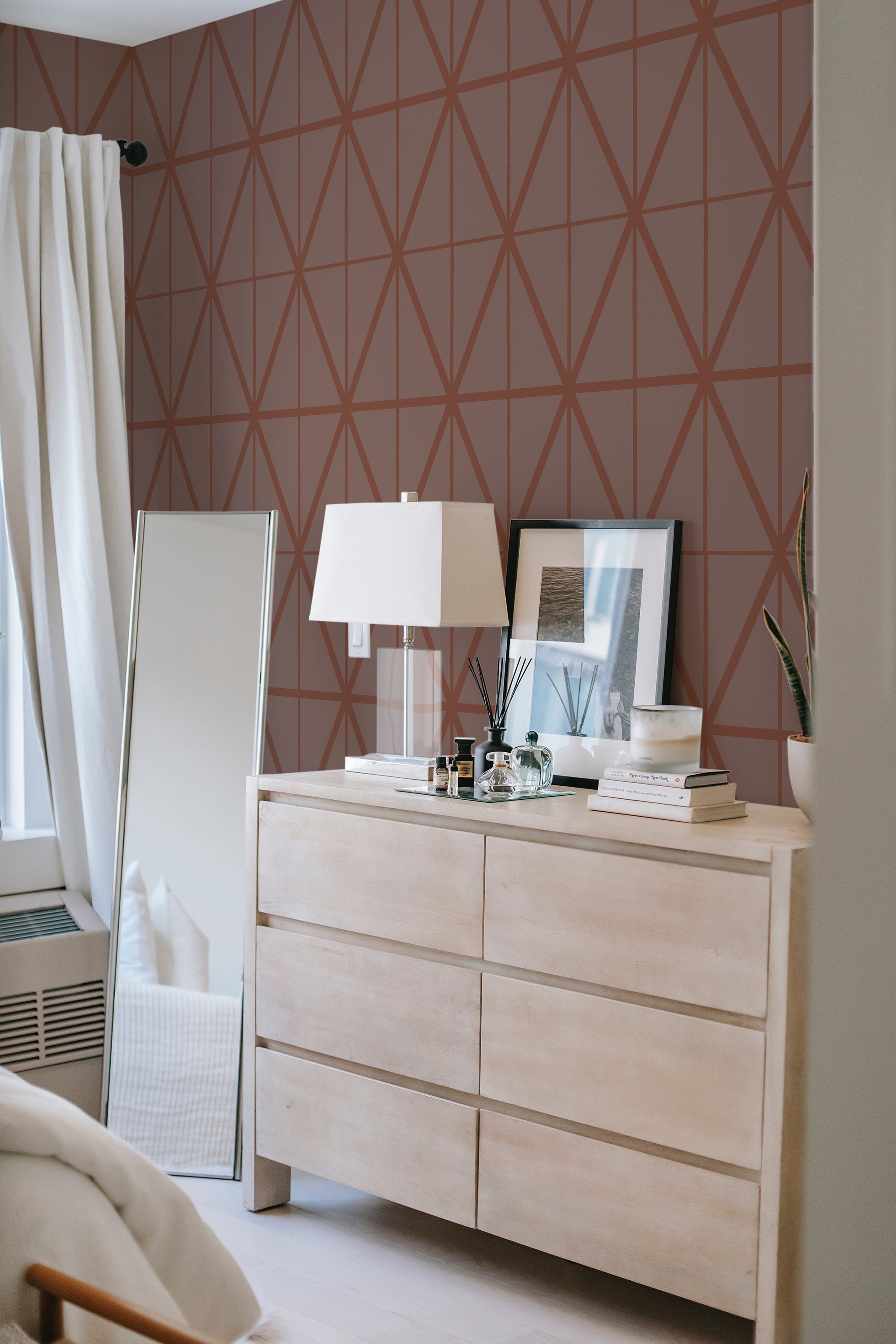 peel and stick wallpaper brown geometric accent wall bedroom dresser mirror minimalist interior