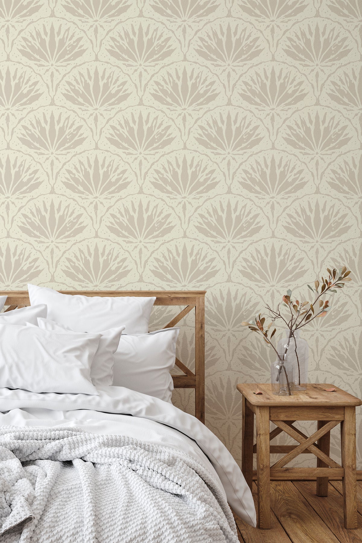 Stylized Lily Bloom peel and stick wallpaper in a bedroom, beige lily fan motif repeats across a full wall.