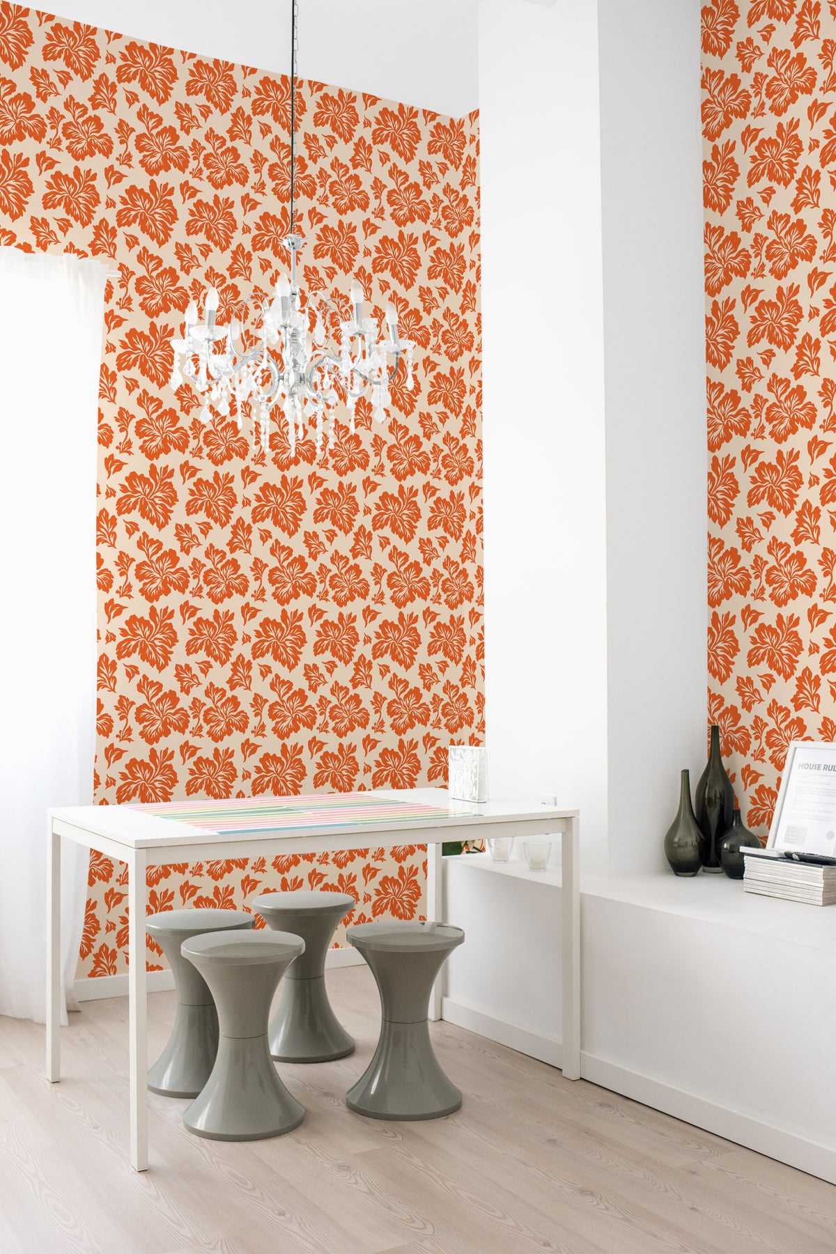 Bold Floral Silhouettes peel and stick wallpaper in a dining room, orange floral silhouettes on beige across full walls.