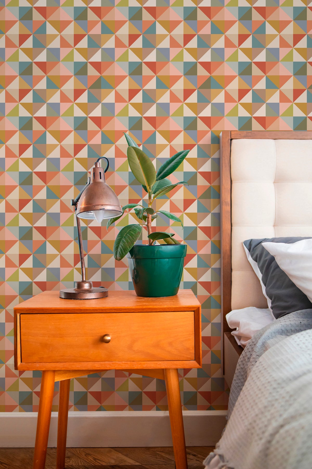 Boho Triangle Tiles peel-and-stick wallpaper for a bedroom wall, featuring a multicolor, triangle tile-inspired repeat.