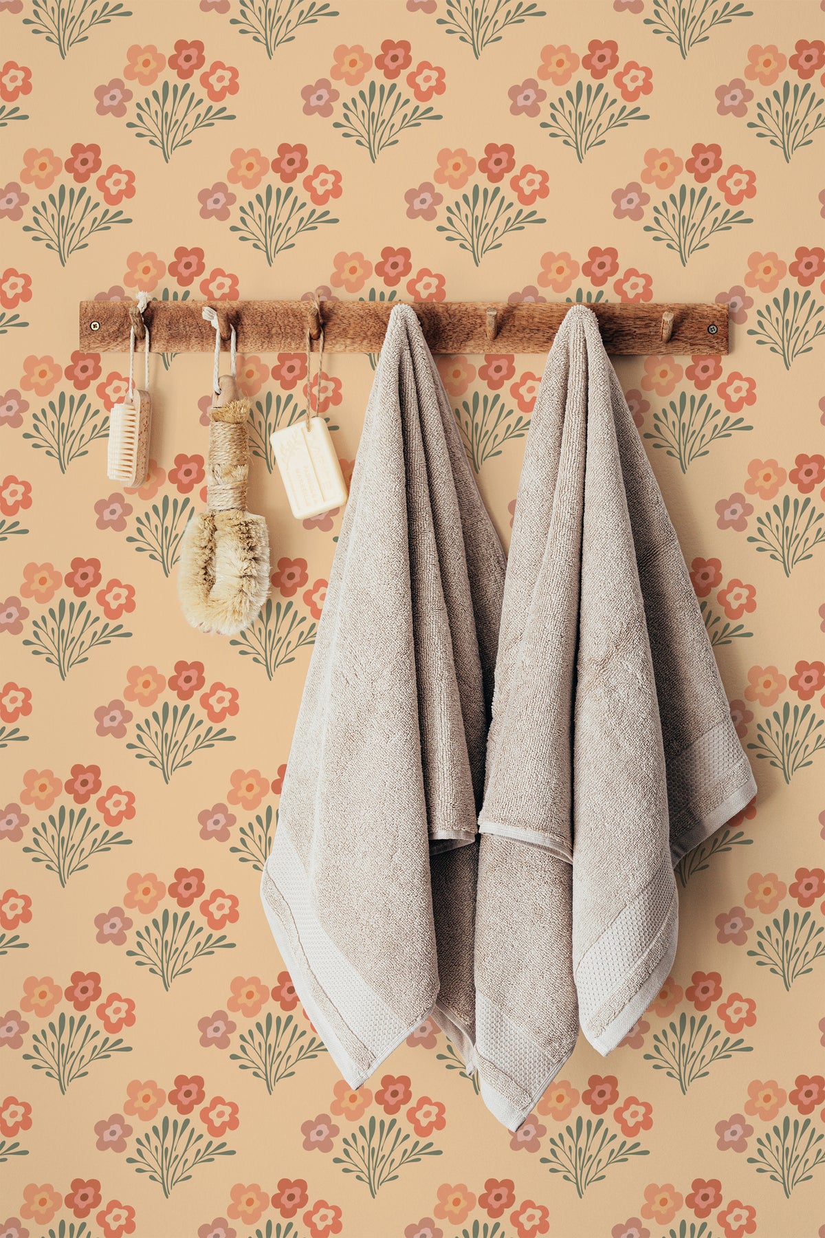 Playful Floral Bouquets peel and stick wallpaper in a bathroom, floral bouquets on tan with repeat across the wall.