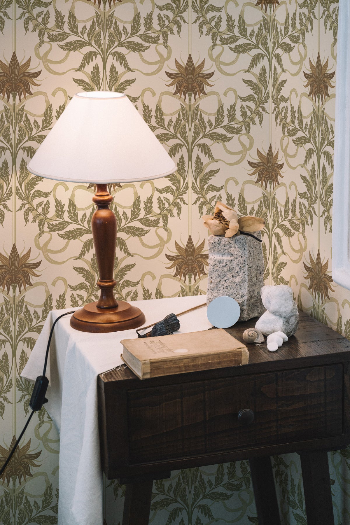 Floral Vine Damask pre-pasted wallpaper on a bedroom wall, featuring large vine damask motifs on a warm beige background.