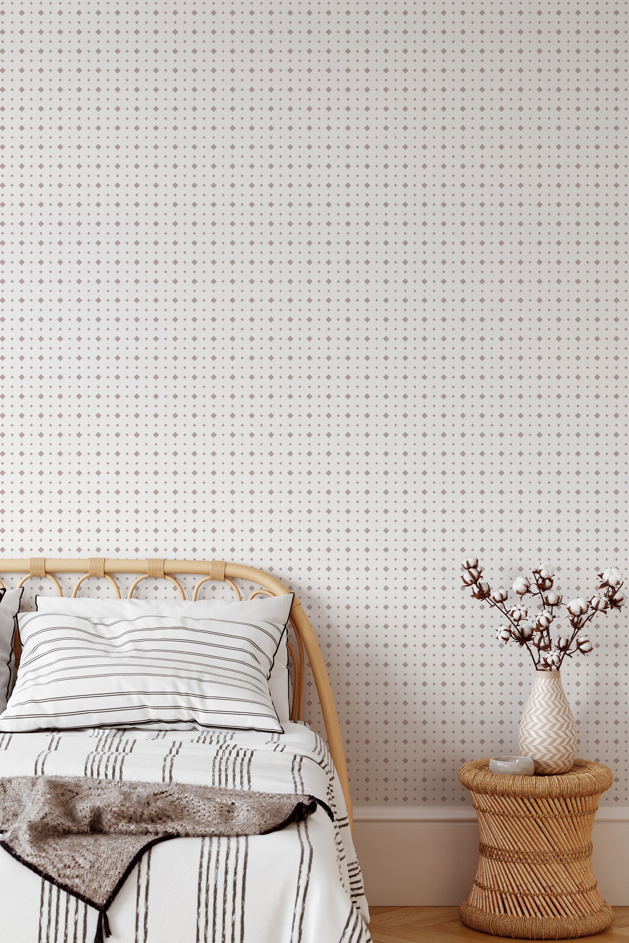 Self-adhesive wallpaper with a Rhombs design covering a wall, repeating small diamond shapes in a subtle pattern.