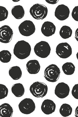 A wallpaper with a pattern of uneven, black brushstroke circles on a white background, creating a modern and artistic look. Peel and stick removable wallpaper.