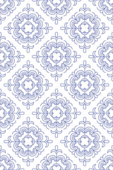 Blue intricate floral tile pattern on white background with symmetrical, mandala-like designs. Peel and stick removable wallpaper.