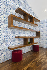 The wallpaper design has a Blue tile collection pattern with intricate geometric motifs and floral elements in varying shades of blue on a white background. Traditional wallpaper.