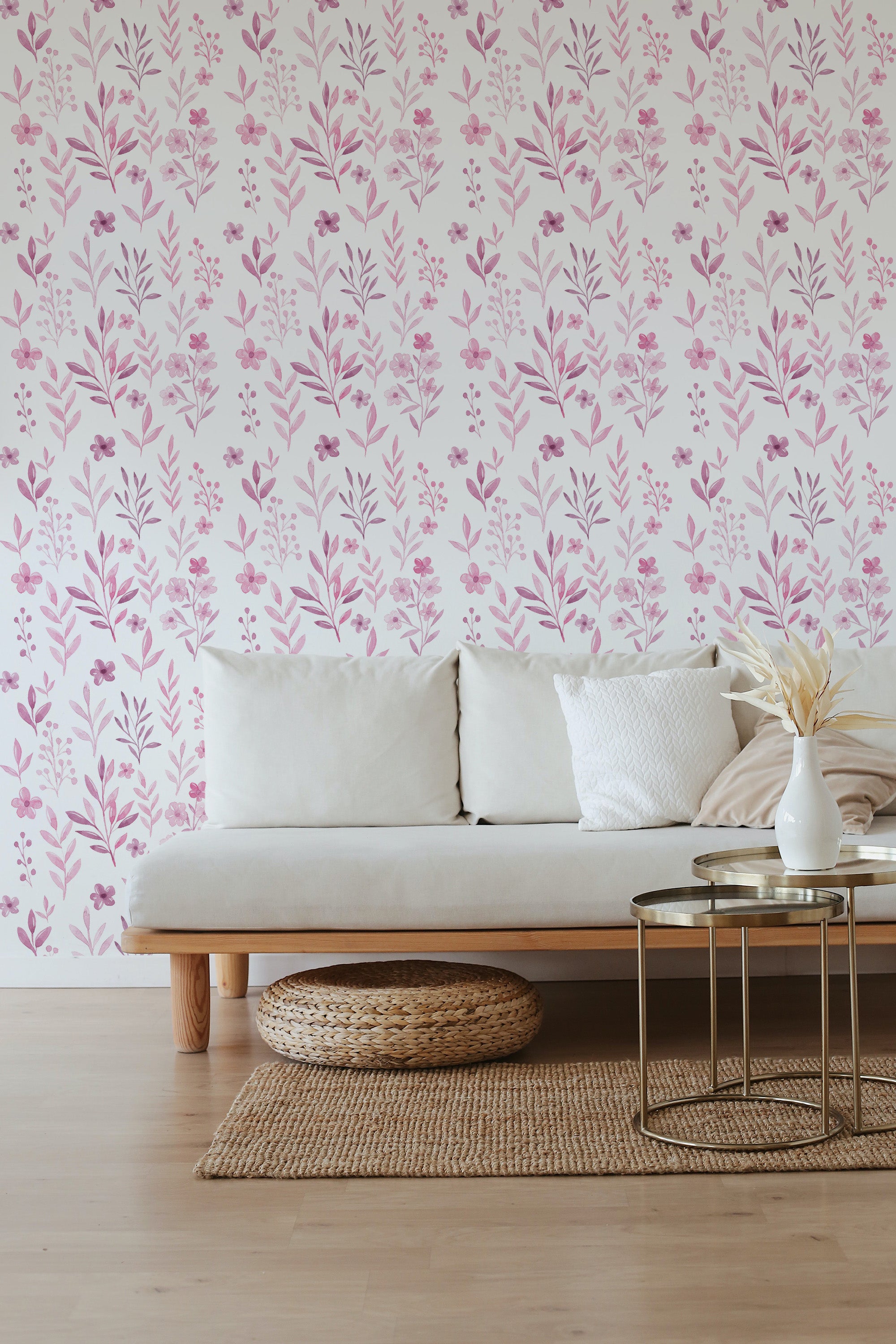 Pink watercolor flowers scattered in a delicate pattern on a white background, with soft, leafy accents creating a serene and gentle atmosphere. Traditional wallpaper.