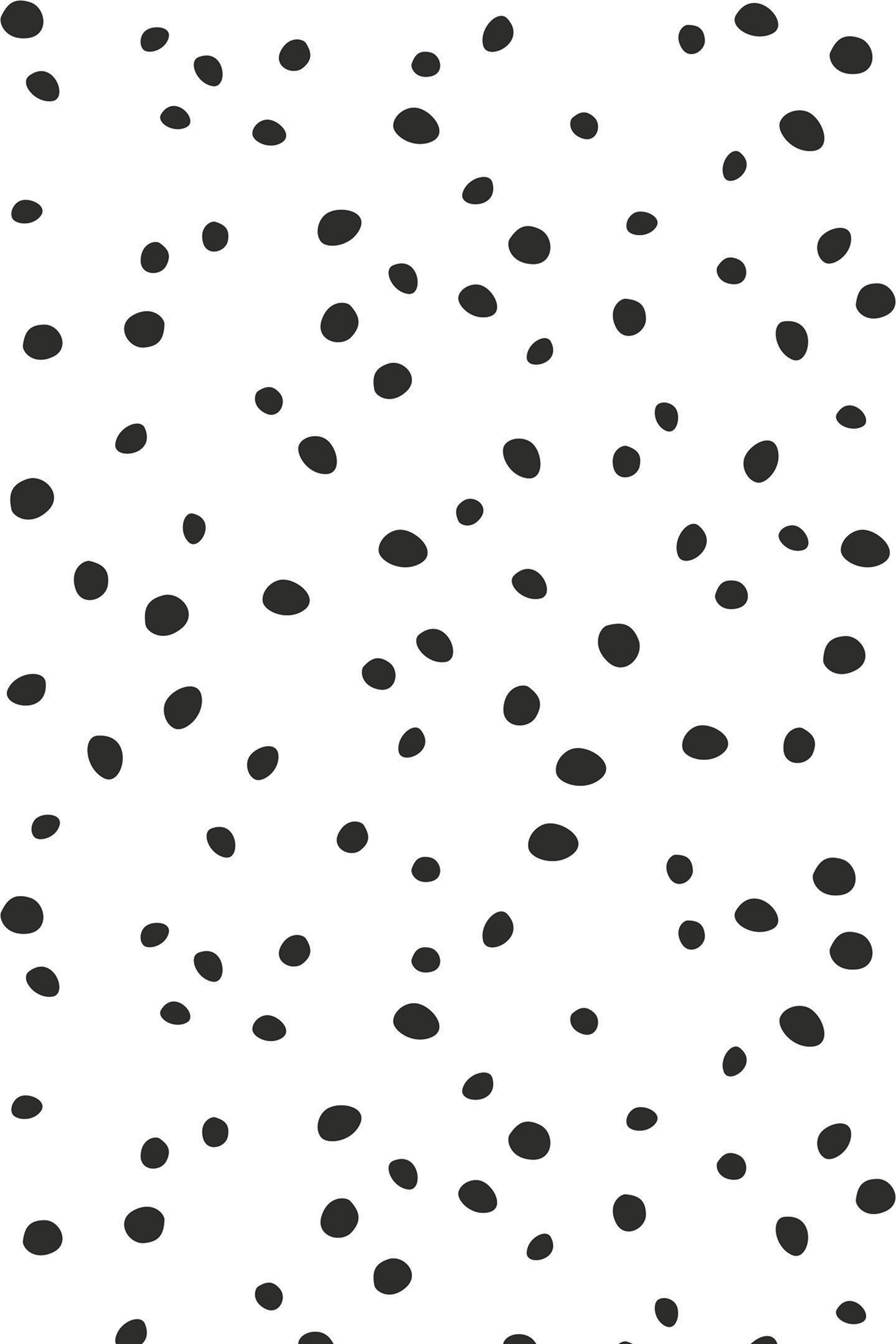 Black irregular dots scattered across a white background, forming a simple and modern pattern for peel and stick removable wallpaper.