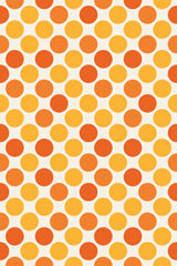 Yellow and orange dots arranged in a repeating pattern on a light background, peel and stick removable wallpaper.