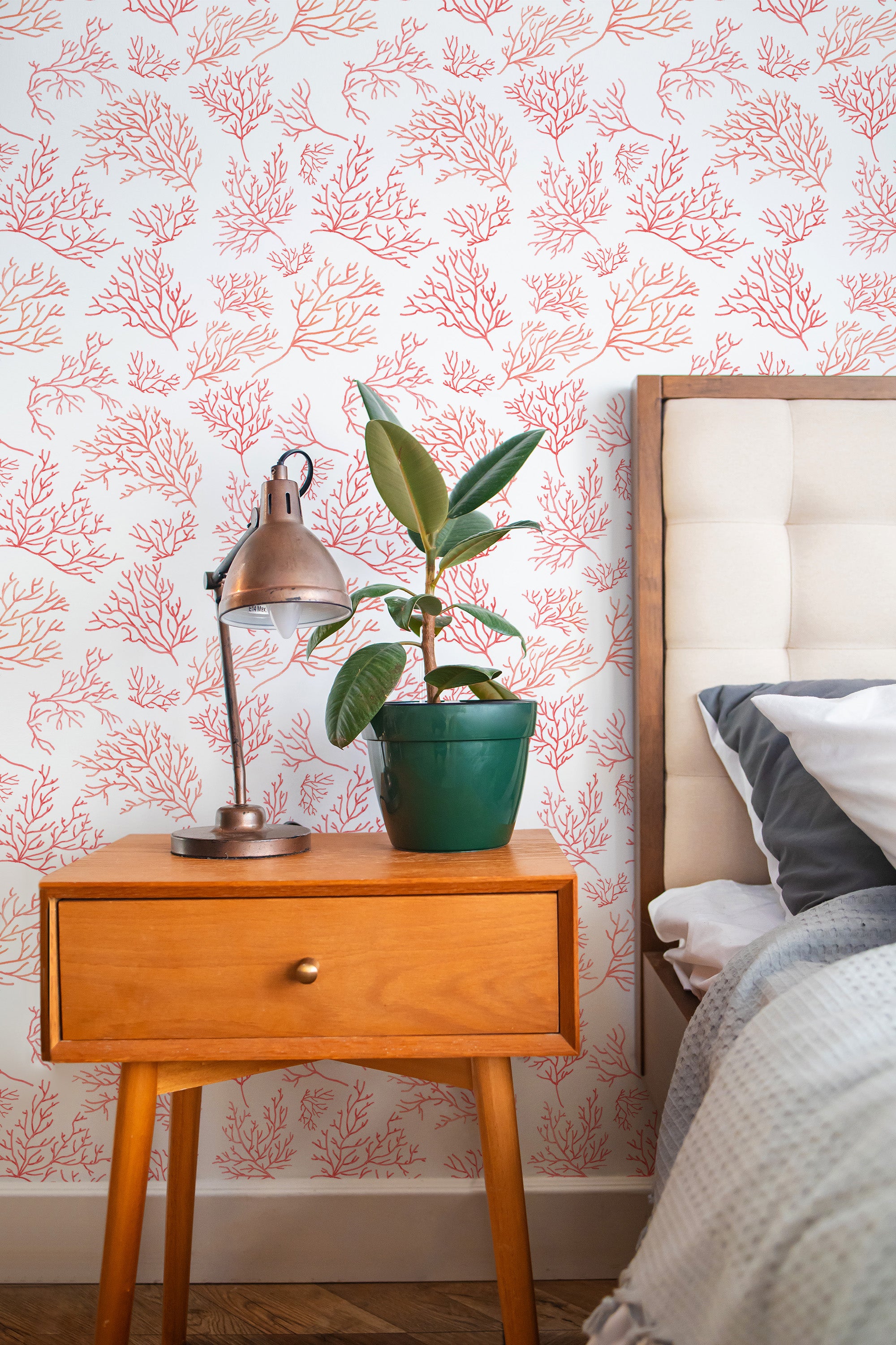 Self-adhesive wallpaper with a Pink Coral pattern in a hand-drawn style, featuring delicate branch-like coral accents in varying shades of pink on a light background.