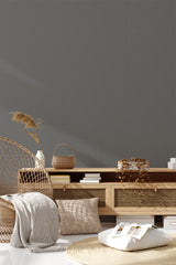 A room with Harlequin-style wallpaper covering the wall, featuring an intricate, geometric pattern in a subtle, neutral color palette for a refined and elegant look,raditional wallpaper.