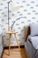 Self-adhesive wallpaper with a Green Boho Rainbow design, featuring minimalist green semi-circle patterns on a white background, adding a touch of nature-inspired elegance to the room.