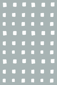 A repeating pattern of irregular white square blocks on a muted green background, peel and stick removable wallpaper.
