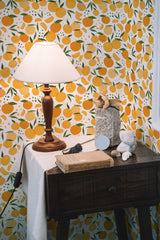 Self-adhesive wallpaper with a vibrant design of orange fruits, green leaves, and small white flowers on a white background.