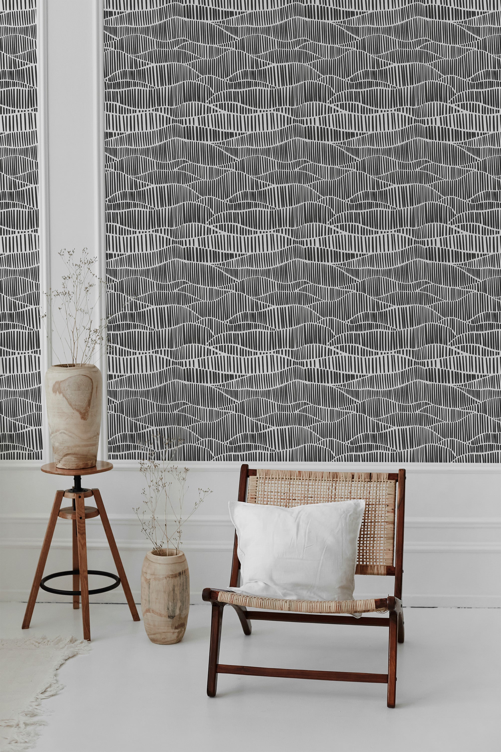 Black and white wallpaper with a linear, interconnected mesh-like pattern creating a modern, grid-like effect in the room. The design adds depth and texture while maintaining the classic feel of traditional wallpaper.