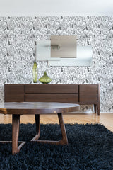 Black and white wallpaper with intricate forest line art of trees, leaves, and small animals, creating a delicate, nature-inspired pattern. Traditional wallpaper.