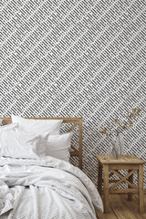 Self-adhesive Memphis pattern wallpaper with black and white geometric shapes arranged in a diagonal grid over a white background.