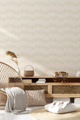 The wallpaper design has a subtle golden leaf pattern with intricate detailing that creates an elegant and refined look, giving the room a warm and sophisticated atmosphere. Traditional wallpaper.