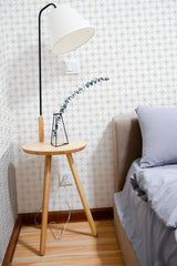 Self-adhesive wallpaper with a Japanese traditional pattern featuring a repetitive geometric design in soft gold tones on a white background.