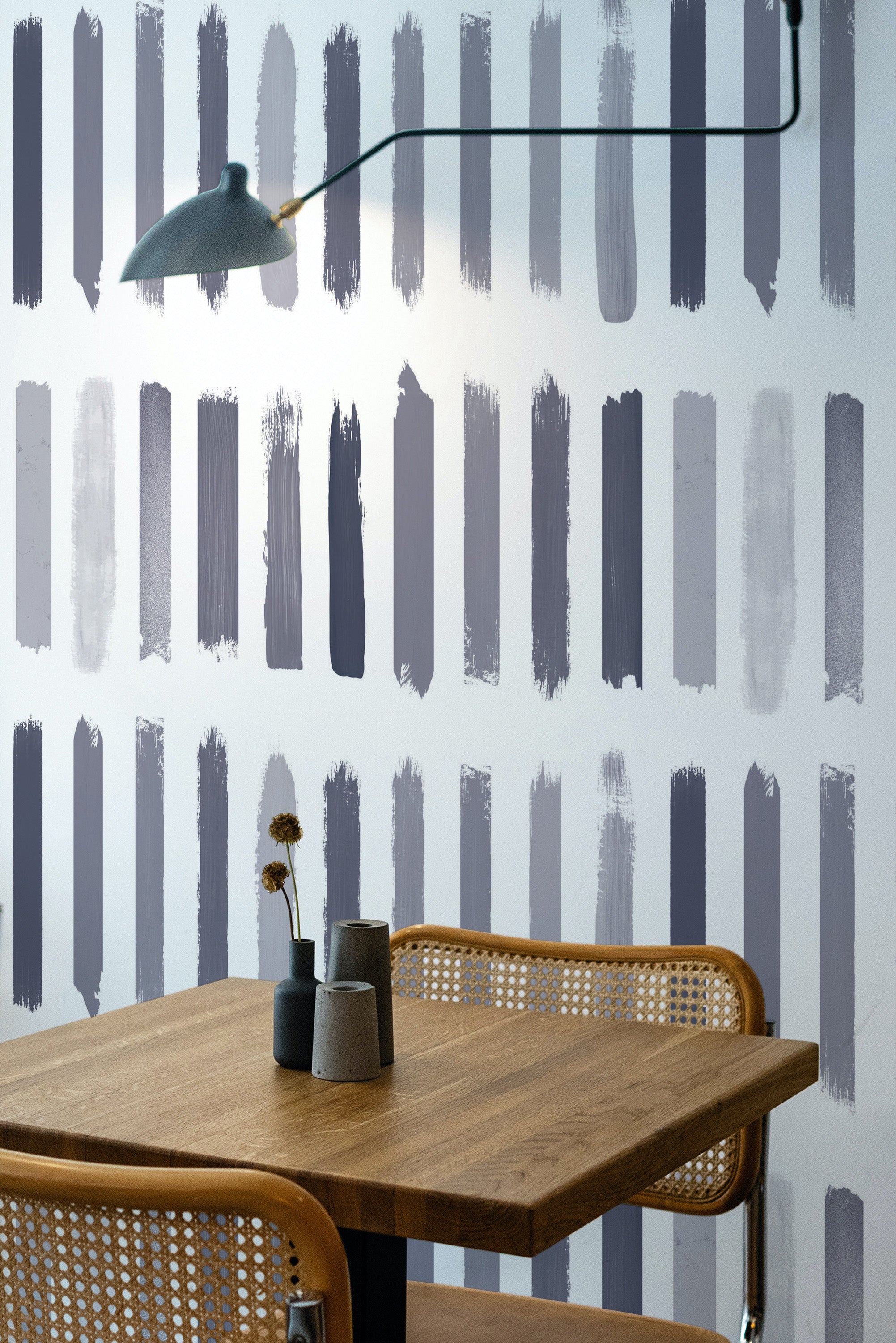 Self-adhesive wallpaper with a purple brush stroke pattern, featuring vertical strokes in varying shades of purple on a white background, creates a modern, artistic look in the room.