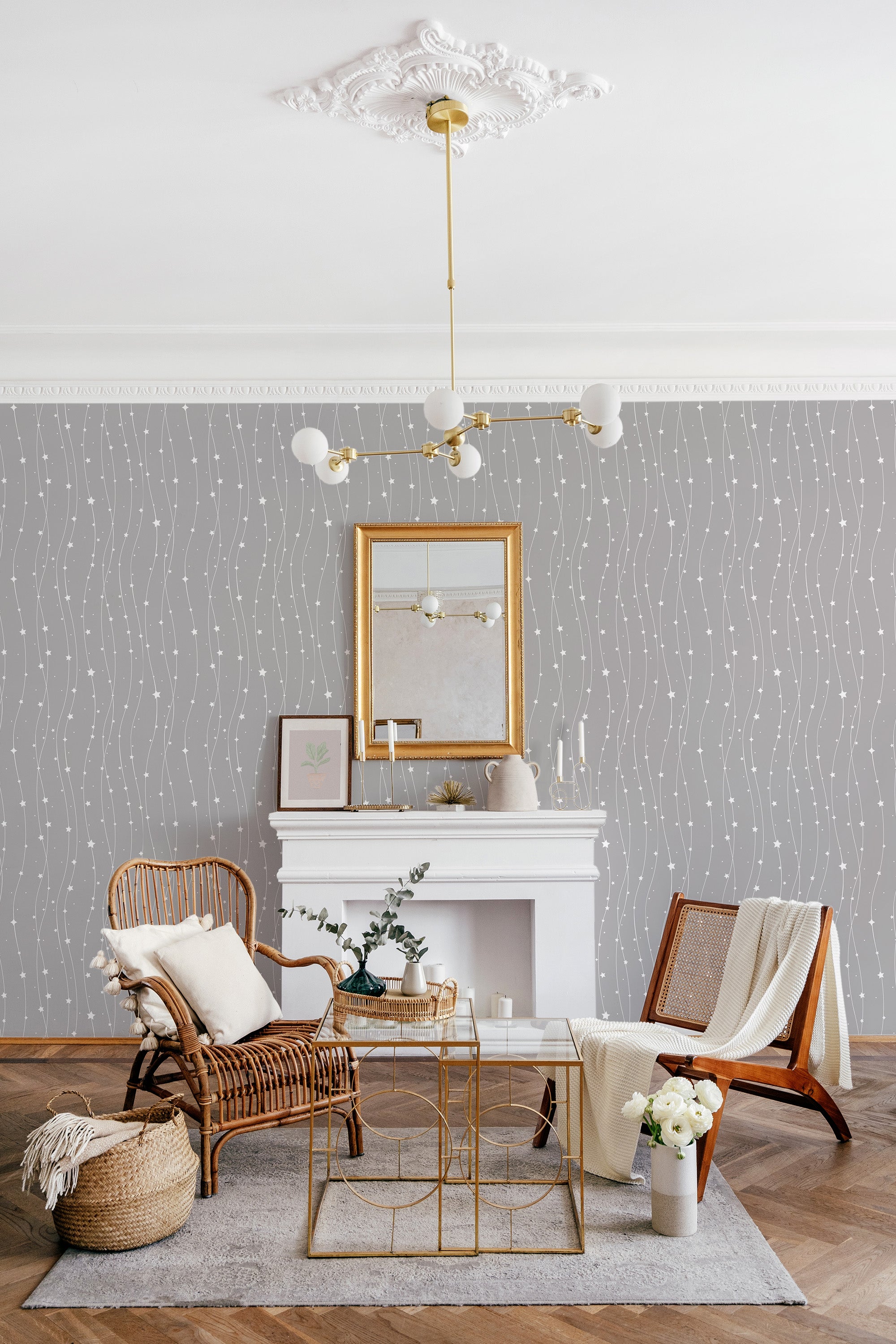 A room with gray wallpaper adorned with vertical lines of small, connected silver stars creating a delicate geometric pattern, evoking a modern yet classic ambiance. Traditional wallpaper.