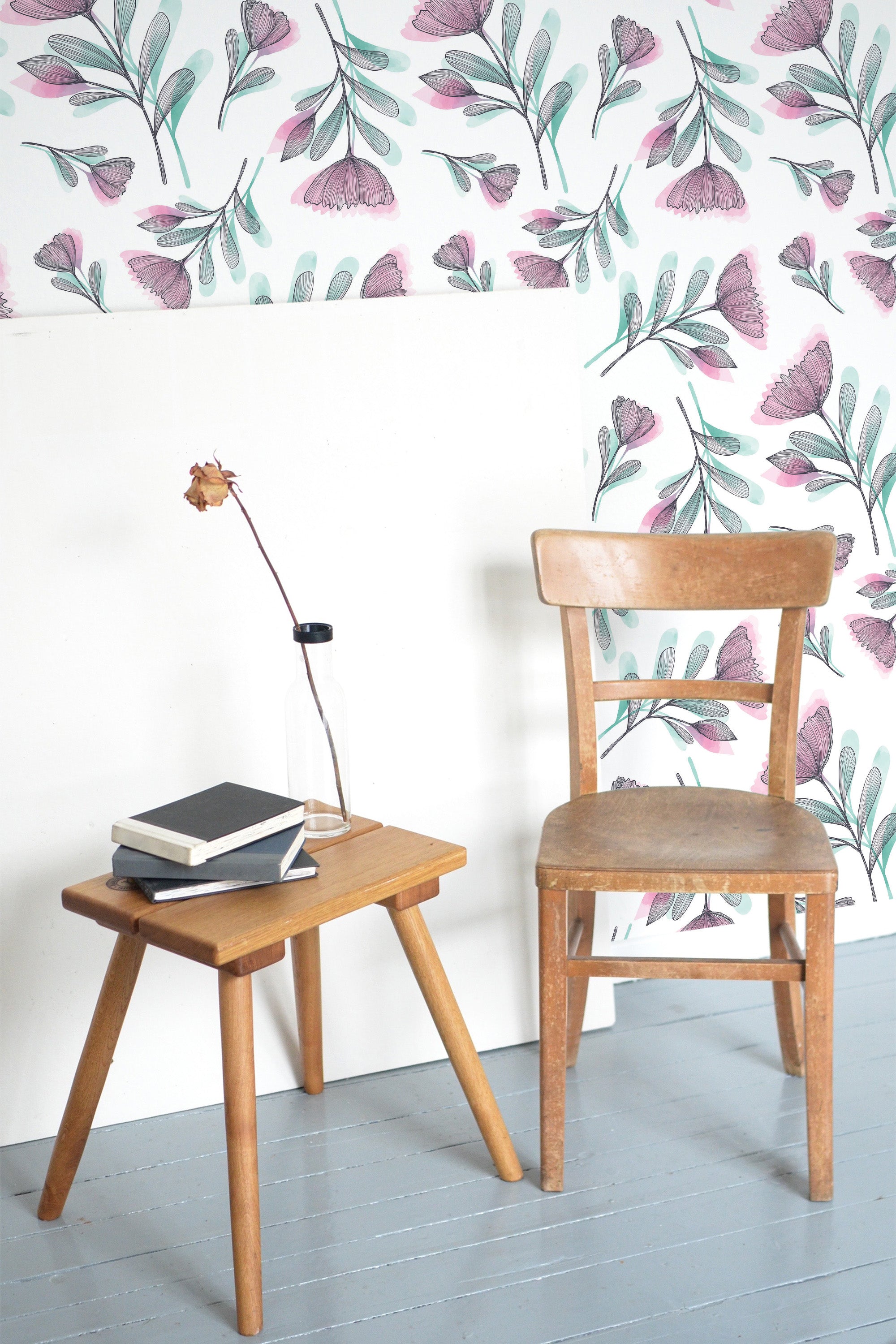 Self-adhesive wallpaper with a watercolor flower design in soft pink and green tones, set against a white background.