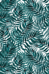 Blue tropical leaf pattern with overlapping palm leaves set against a white background. Peel and stick removable wallpaper.