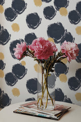 Self-adhesive wallpaper with large, circular paint spots in bold navy blue and soft beige tones, arranged randomly on a white background.