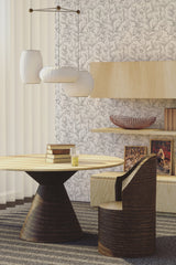 Minimal floral wallpaper with delicate, intertwined leafy branches in a subtle, monochromatic color scheme behind modern furniture. Traditional wallpaper.