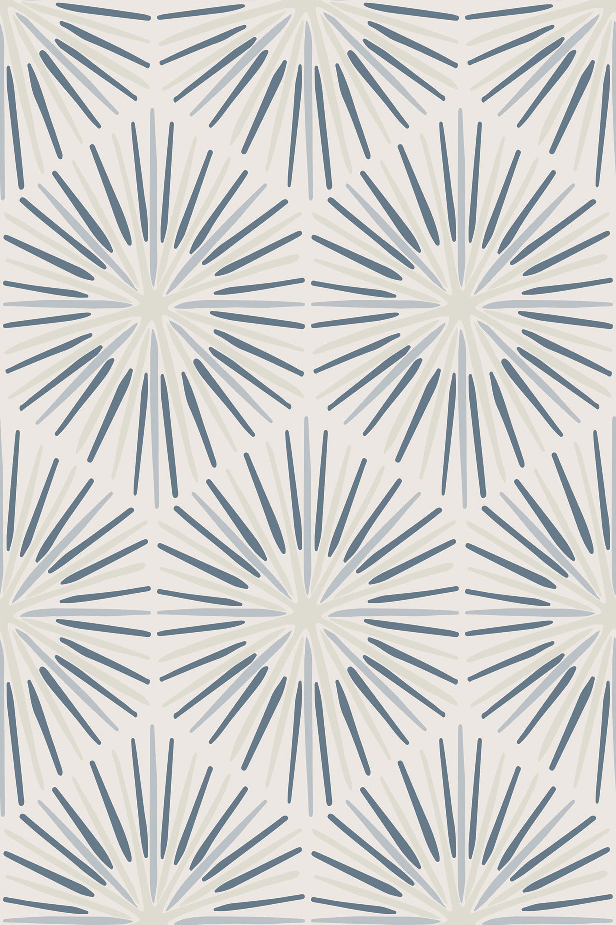 Abstract pattern with repeating blue starburst shapes on a light beige background, arranged in a symmetrical grid. Peel and stick removable wallpaper.