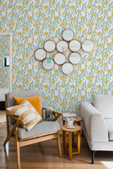 Wallpaper with a repeating pattern of orange fruit and green leaves, accompanied by soft, curving vines on a white background, creating a vibrant and fresh look. Traditional wallpaper.