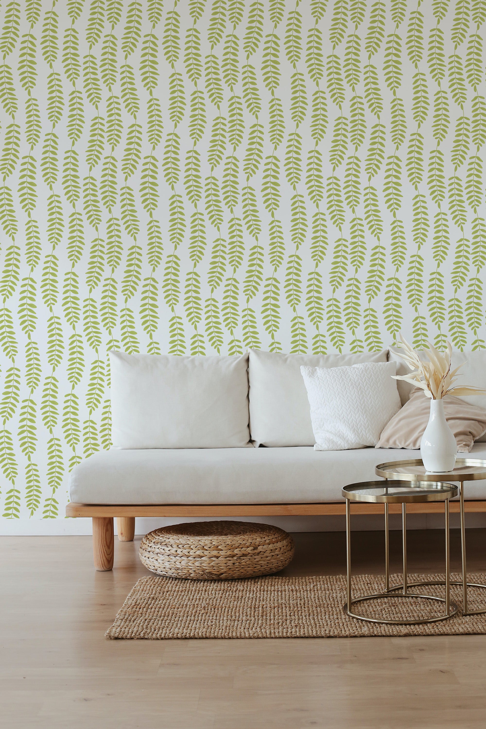A room with wallpaper in a repeating pattern of green leaf lines on a white background, adding a nature-inspired aesthetic,raditional wallpaper.