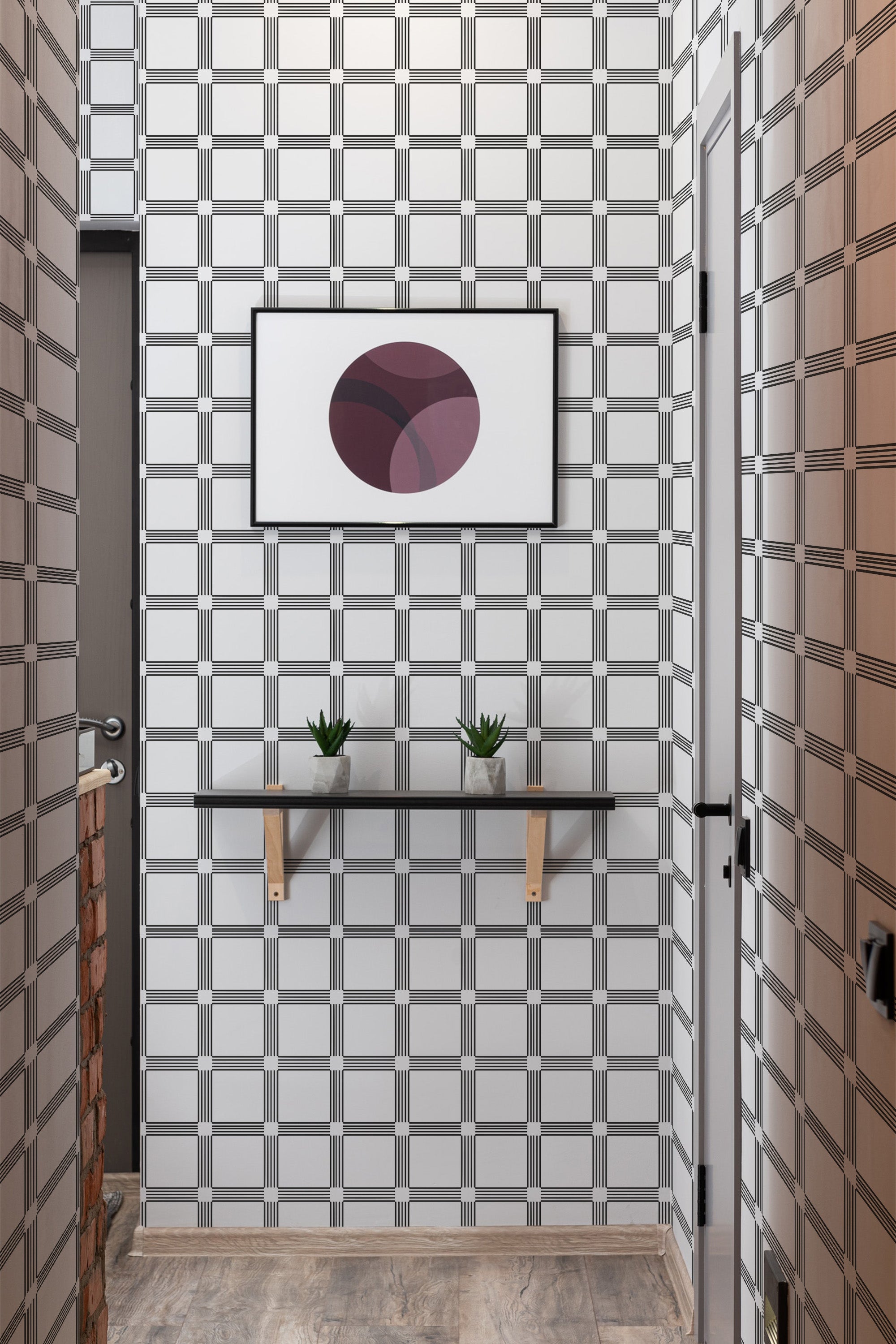 Square geometric line pattern with intersecting lines creating a grid-like design in black and white covers the walls, giving the room a modern yet classic look, traditional wallpaper.