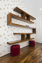 Wall adorned with a minimalist Nursery brush stroke pattern consisting of evenly spaced horizontal and vertical brown lines on a white background, creating a clean and modern aesthetic. Traditional wallpaper.