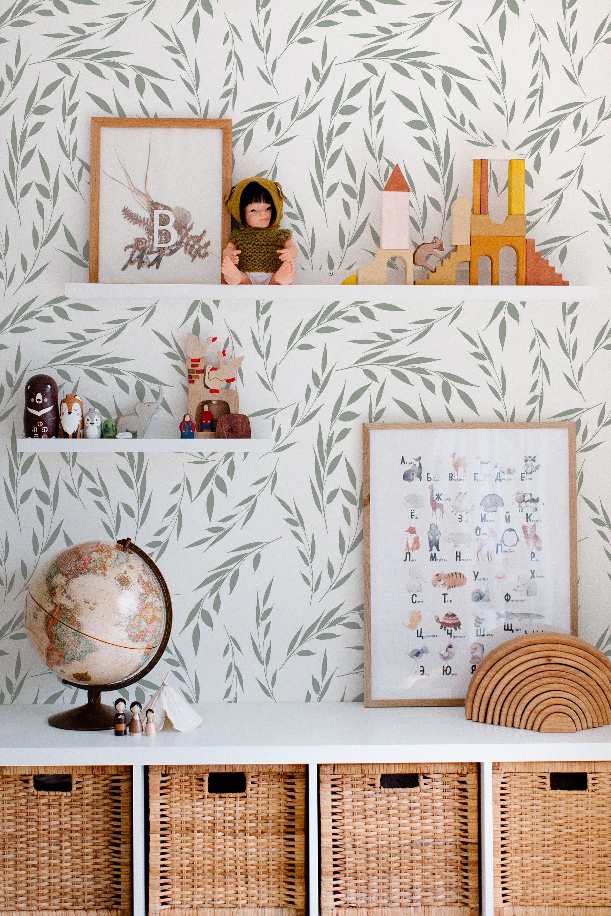 Self-adhesive wallpaper with a Leaf design. Delicate green leaves gracefully scatter across a white background, creating a fresh and natural atmosphere in the room.