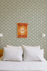 Self-adhesive retro geometric line wallpaper with a repeating pattern of interlocking, white, rounded rectangles on an olive green background, adding a vintage-inspired aesthetic to the room.
