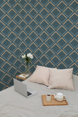 Self-adhesive bold geometric wallpaper with intersecting diamond shapes in shades of dark blue and beige, creating a modern and dynamic pattern.