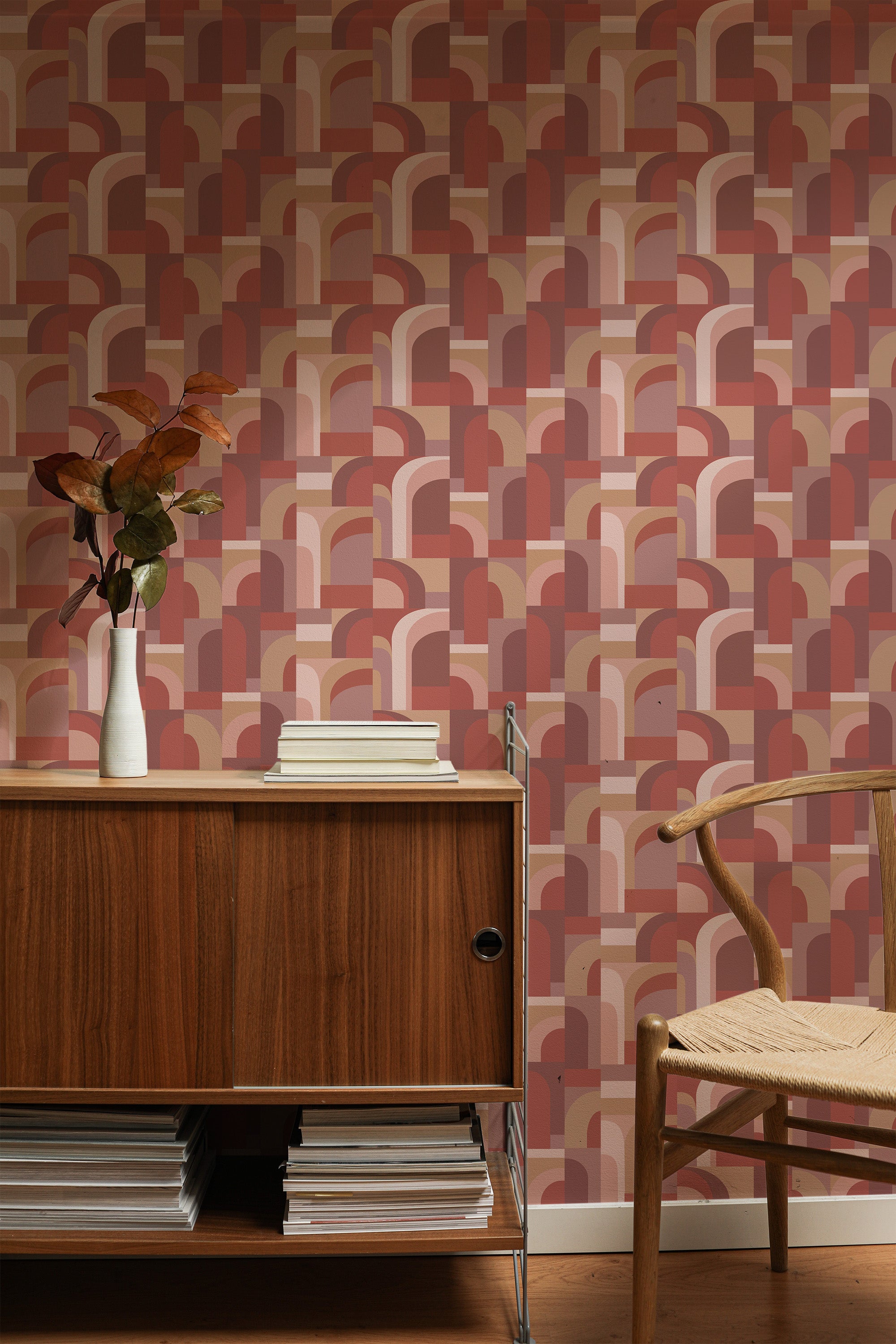Self-adhesive wallpaper with a Retro 70s design featuring a repeating pattern of arched shapes in warm tones of brown, beige, and pink.